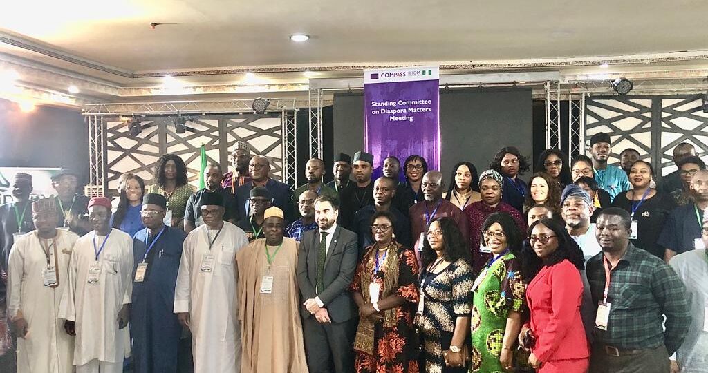 Mr. Victor Lutenco, Rep IOM Chief of Mission (M), Engr. Dr. Sule Yakubu Bassi, Rep. Hon. Abike Dabiri-Erewa, Chairman/CEO NiDCOM (1st person, Left), with other stakeholders and participants at the 4th Standing Committee on Diaspora Matters Meeting in Abuja