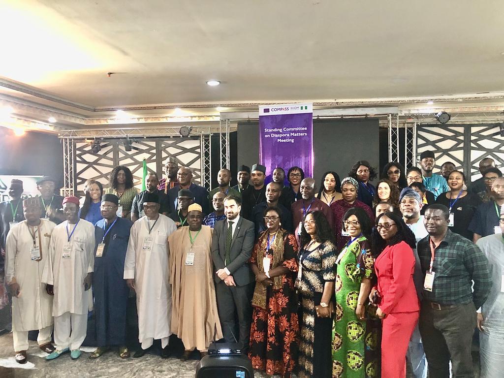 Mr. Victor Lutenco, Rep IOM Chief of Mission (M), Engr. Dr. Sule Yakubu Bassi, Rep. Hon. Abike Dabiri-Erewa, Chairman/CEO NiDCOM (1st person, Left), with other stakeholders and participants at the 4th Standing Committee on Diaspora Matters Meeting in Abuja